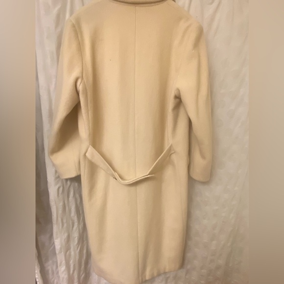 Rock your vintage lifestyle with this Herman Kay white wool coat.Size 14. - Picture 8 of 14